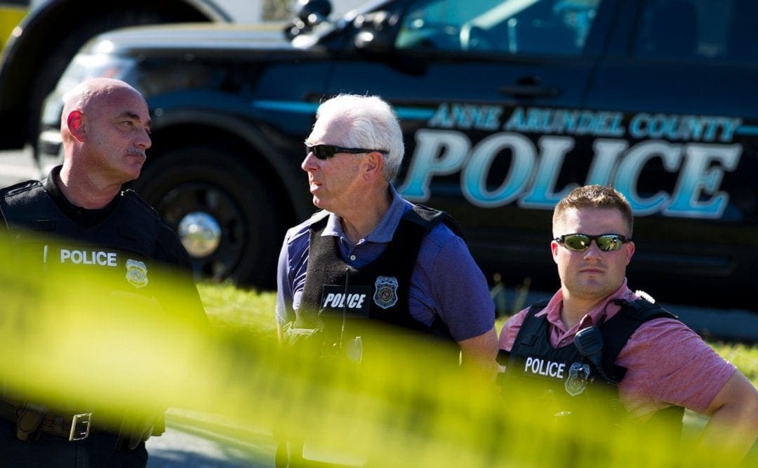 The suspected Maryland newspaper shooter had a history of harassing a woman